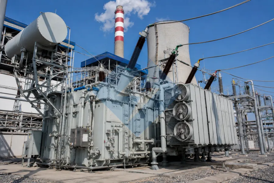 Generator step up transformer installed at a thermal and gas power plant for high voltage electricity transmission and utility grid connection by Evernew Transformer.