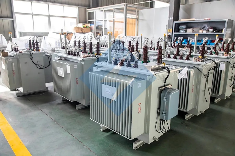 High voltage step up transformer installed in an electrical utility substation for long-distance power transmission and grid stability by Evernew Transformer.
